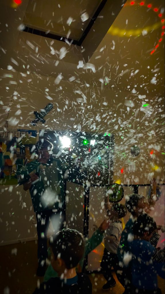 Foam confetti blast during the Minecraft disco finale