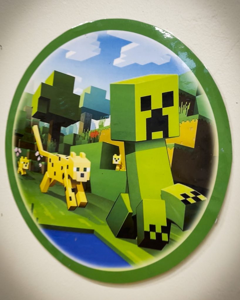 Creeper and ocelot wall decoration used at our Minecraft birthday parties