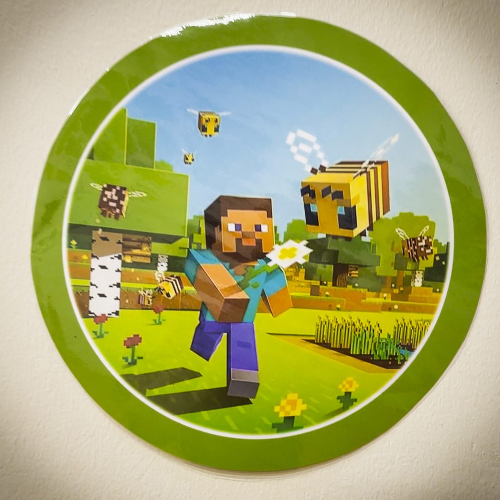Minecraft party wall decoration featuring Steve and buzzing bees
