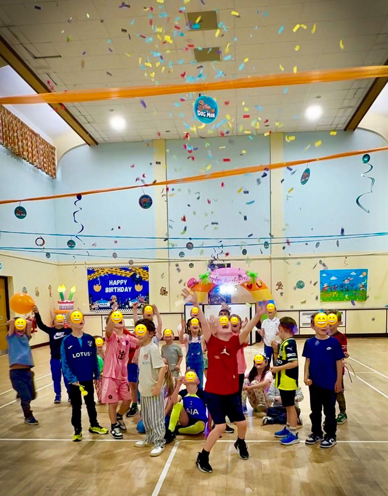 Children celebrating with confetti at Dog Man themed birthday party in Sunningdale