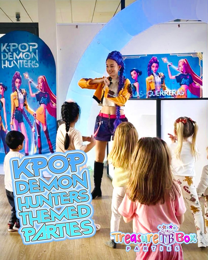 kpop-demon-hunters-dance-party-guildford-surrey - Childrens Party Entertainers | Surrey Hampshire and Berkshire | Treasure Box Parties Children dancing with a KPOP Demon Hunters character entertainer at a birthday party in Guildford Surrey