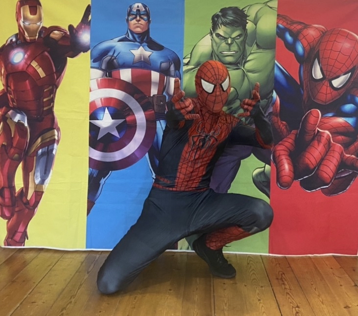 Spiderman party entertainer posing for photos at a children’s birthday party in Hampshire