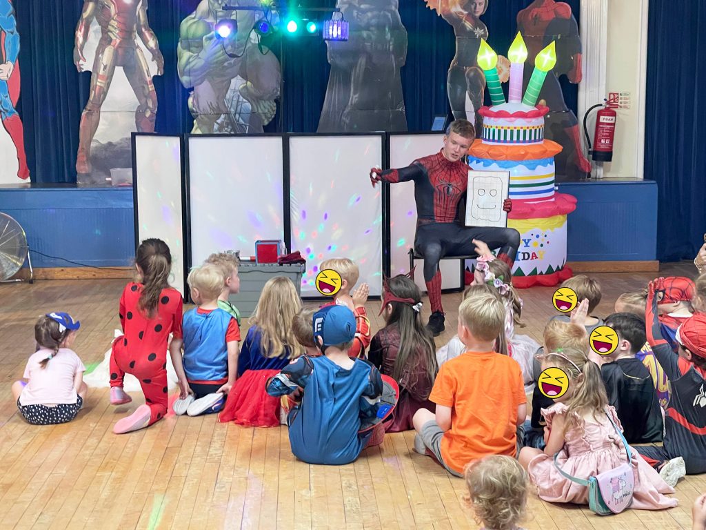 Children enjoying a Spiderman themed party activity with a professional entertainer in Berkshire