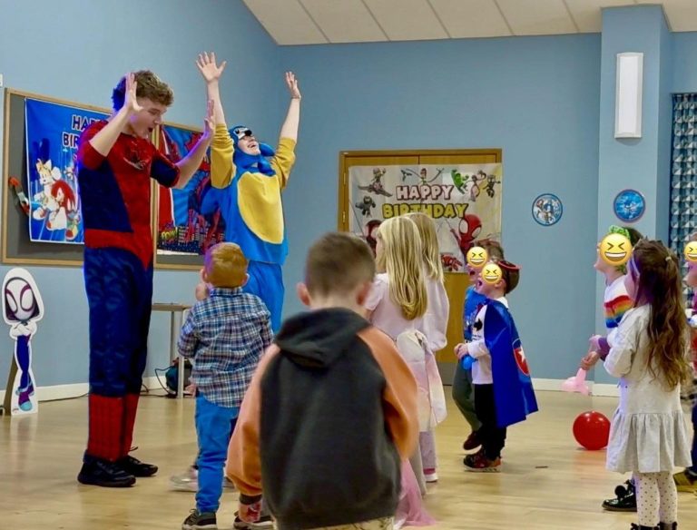 Spider-Man and Sonic entertainers dancing with children