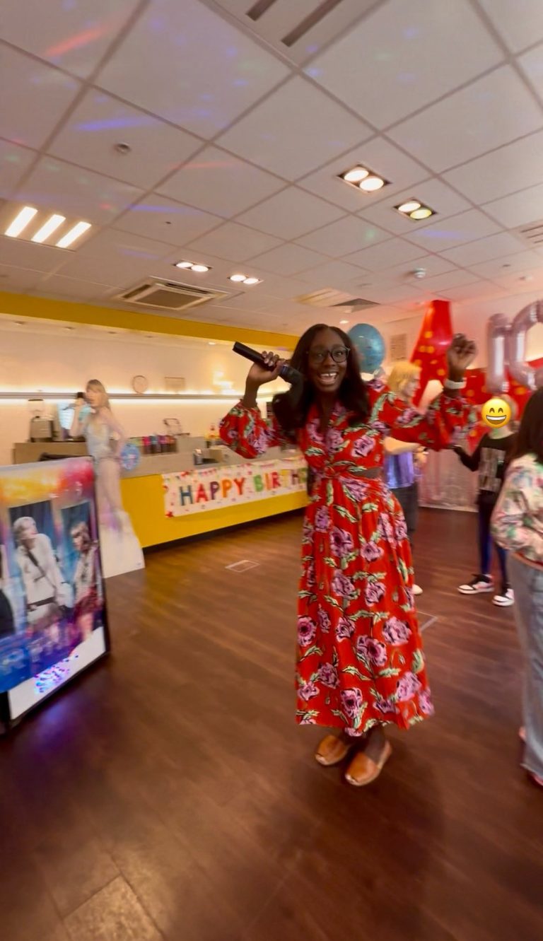 Karaoke singer with a microphone at a pop star party